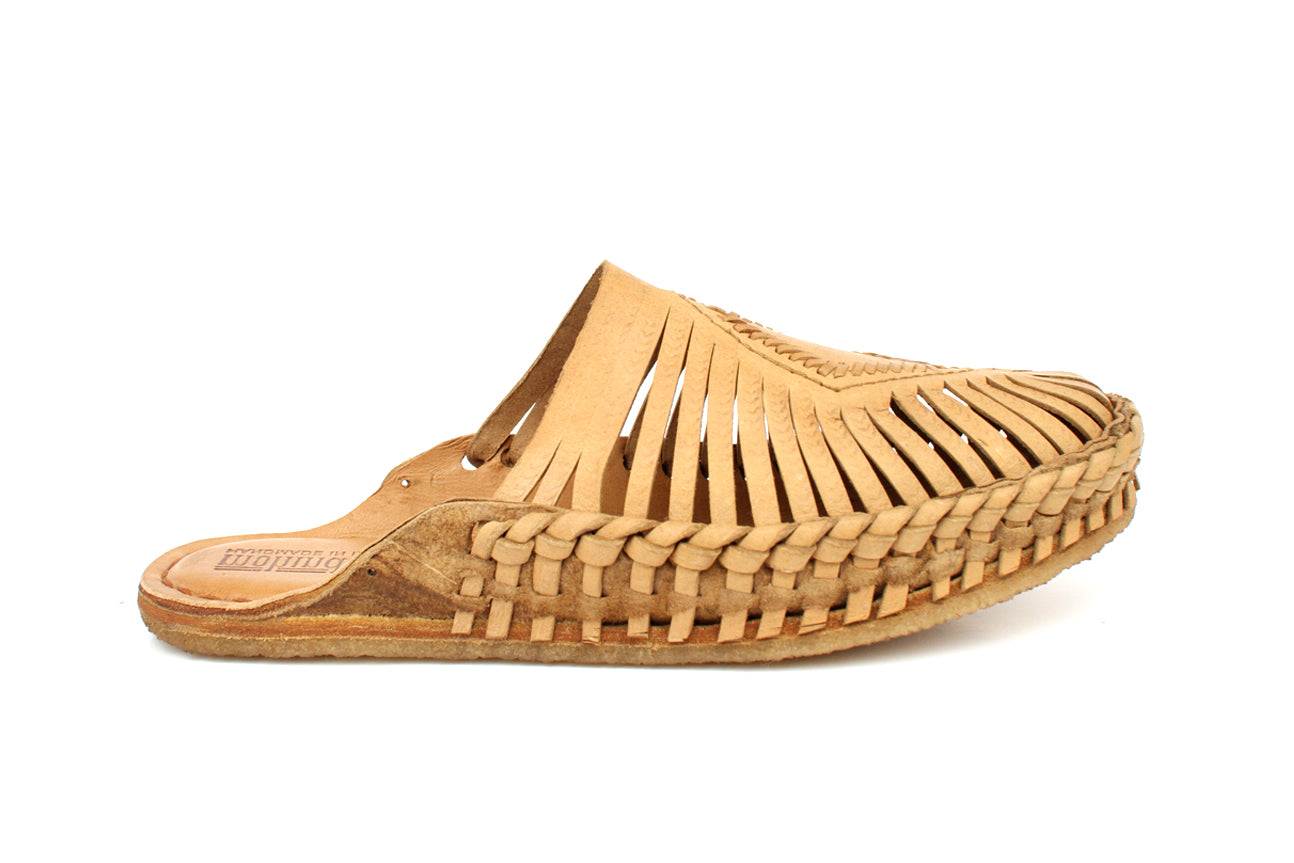 Natural leather slip-on sandals with hand-woven diamond centerpiece